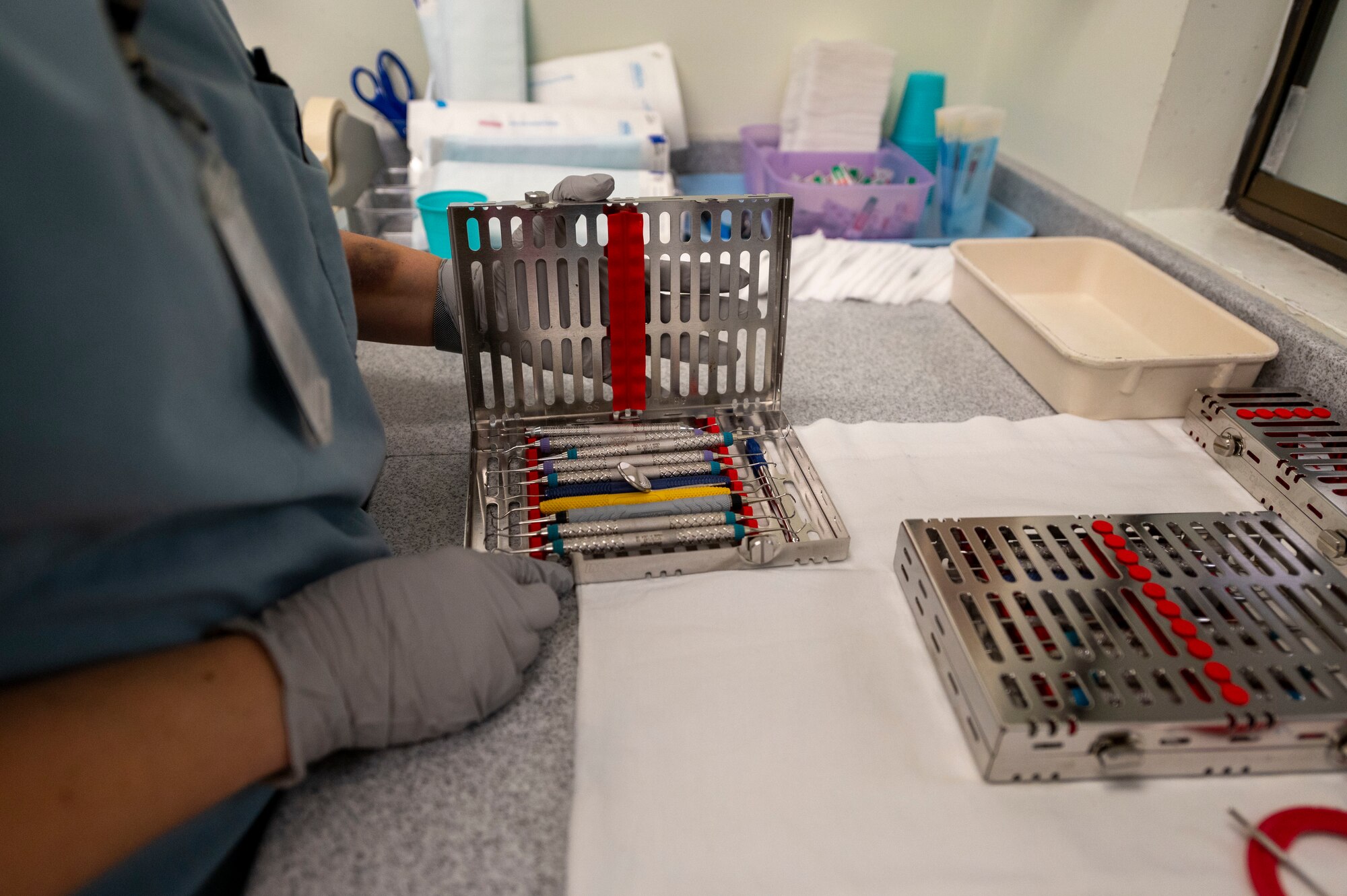 Tabitha Womack, 4th Operational Medical Readiness Squadron dental assistant, analyses dental instruments at Seymour Johnson Air Force Base, North Carolina, Feb. 24, 2022. The Keiker Dental Clinic serves over 4000 active duty Airmen annually. (U.S. Air Force photo by Airman 1st Class Kevin Holloway)