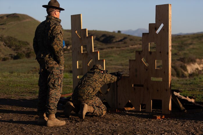 U.S. Navy Petty Officer 2nd Class Michael Jay, a religious program specialist with Marine Corps Installations West, fires an M4 carbine during the Marine Corps Marksmanship Competition on Marine Corps Base Camp Pendleton, Calif., Feb. 16, 2022. The competition is designed to significantly enhance participants’ proficiency in the use of individual small arms by refining fundamental marksmanship skills, learning marksmanship techniques, and pushing through mental and physical boundaries in a competitive forum.