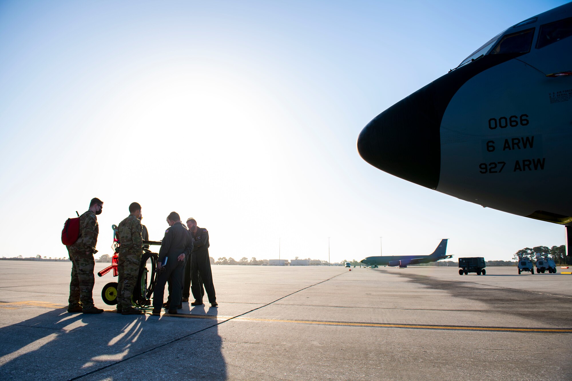 U.S. Air Force Airmen from the 91st Air Refueling Squadron complete pre-flight checks at MacDill Air Force Base, Florida, Feb. 22, 2022, before escorting the U.S. Air Force Demonstration Squadron “Thunderbirds” back to Nellis Air Force Base, Nevada.