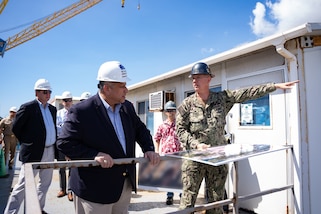 JOINT BASE PEARL HARBOR HICKAM, Hawaii (February 27, 2022)- Secretary of the Navy Carlos Del Toro looks at the proposed Dry Dock 5 site at Pearl Harbor Naval Shipyard and Intermediate Maintenance Facility. The Shipyard Infrastructure Optimization Program will support future Virginia-class submarine maintenance and optimize work across the shipyard. Secretary Del Toro is in Hawaii to meet with families and senior officials and to see first-hand the progress that has been made in restoring and protecting the island’s safe drinking water. (U.S. Navy photo by Dave Amodo/Released)