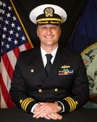 Commander Travis Dvorak