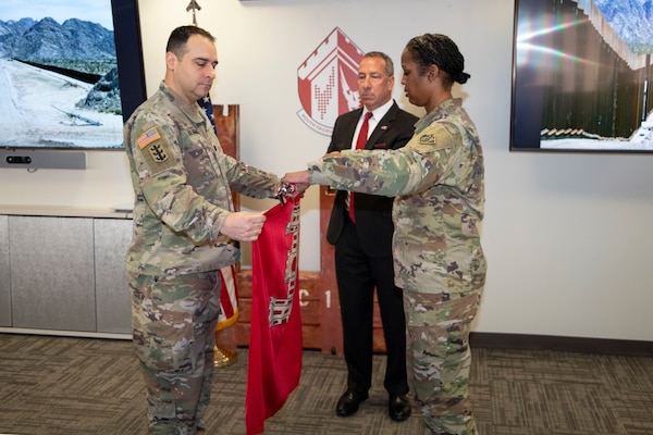 Col. Antoinette R. Gant commander of the U.S. Army Corps of Engineer, South Pacific Division, right, and Lt. Col. Jeffrey M. Beeman, former commander of the South Pacific Border District, left, case the colors during the District’s inactivation ceremony Feb. 25 in Phoenix. Gant served as the third commander of the former District before assuming the role as division commander.