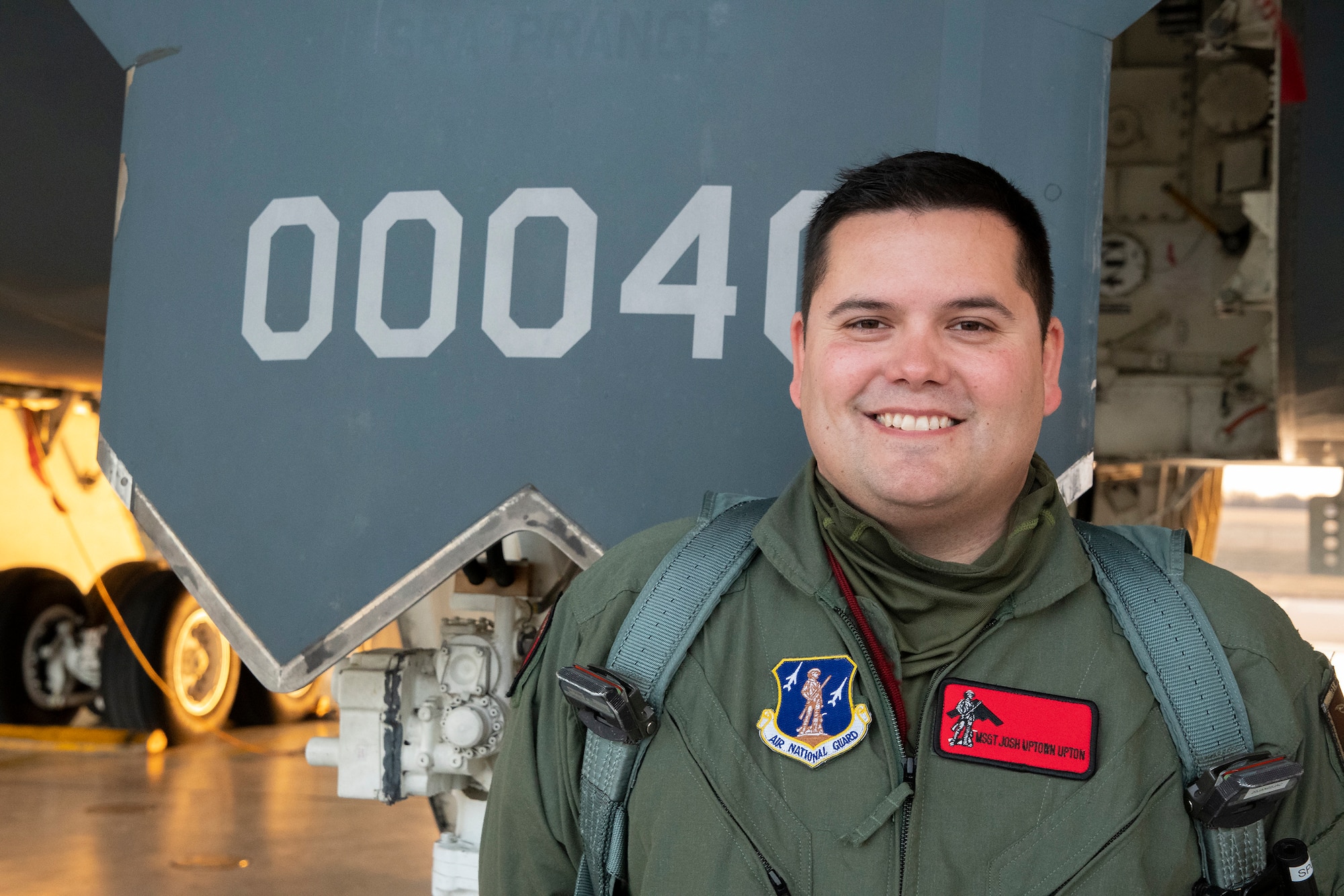 Master Sgt. Joshua Upton, the 131st Bomb Wing's Maintainer of the Year, poses for a photo before an incentive flight in a B-2 Spirit stealth bomber, Jan. 27, 2022, at Whiteman Air Force Base, Missouri. As a dedicated crew chief for Spirit 88-0329, Upton took primary responsibility for ensuring the aircraft was ready to conduct operations anytime, anywhere. (U.S. Air National Guard photo, 131st Bomb Wing Public Affairs)