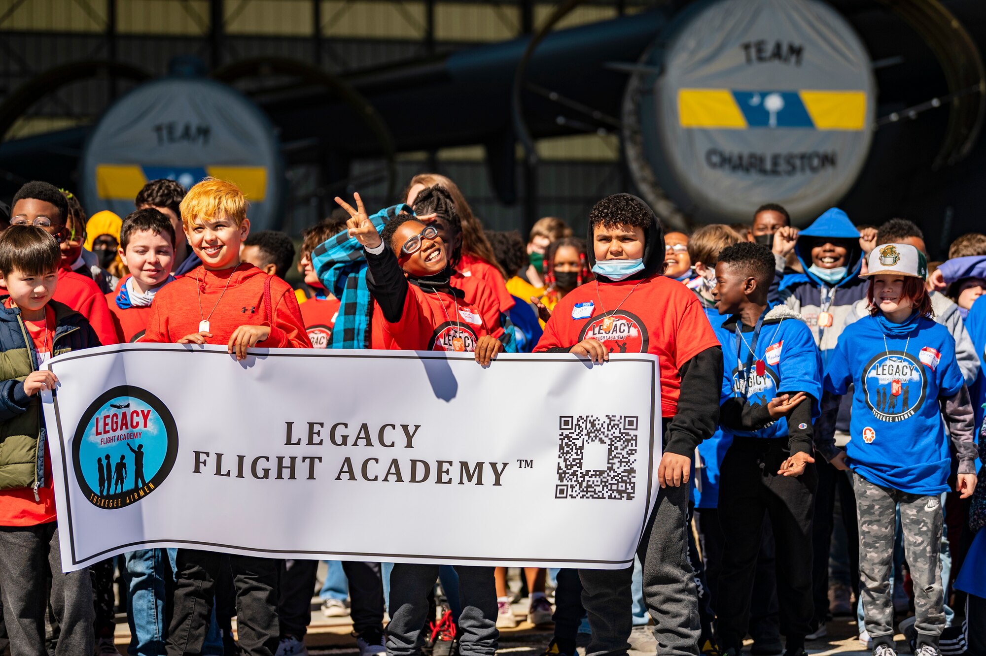 participants hold a sign