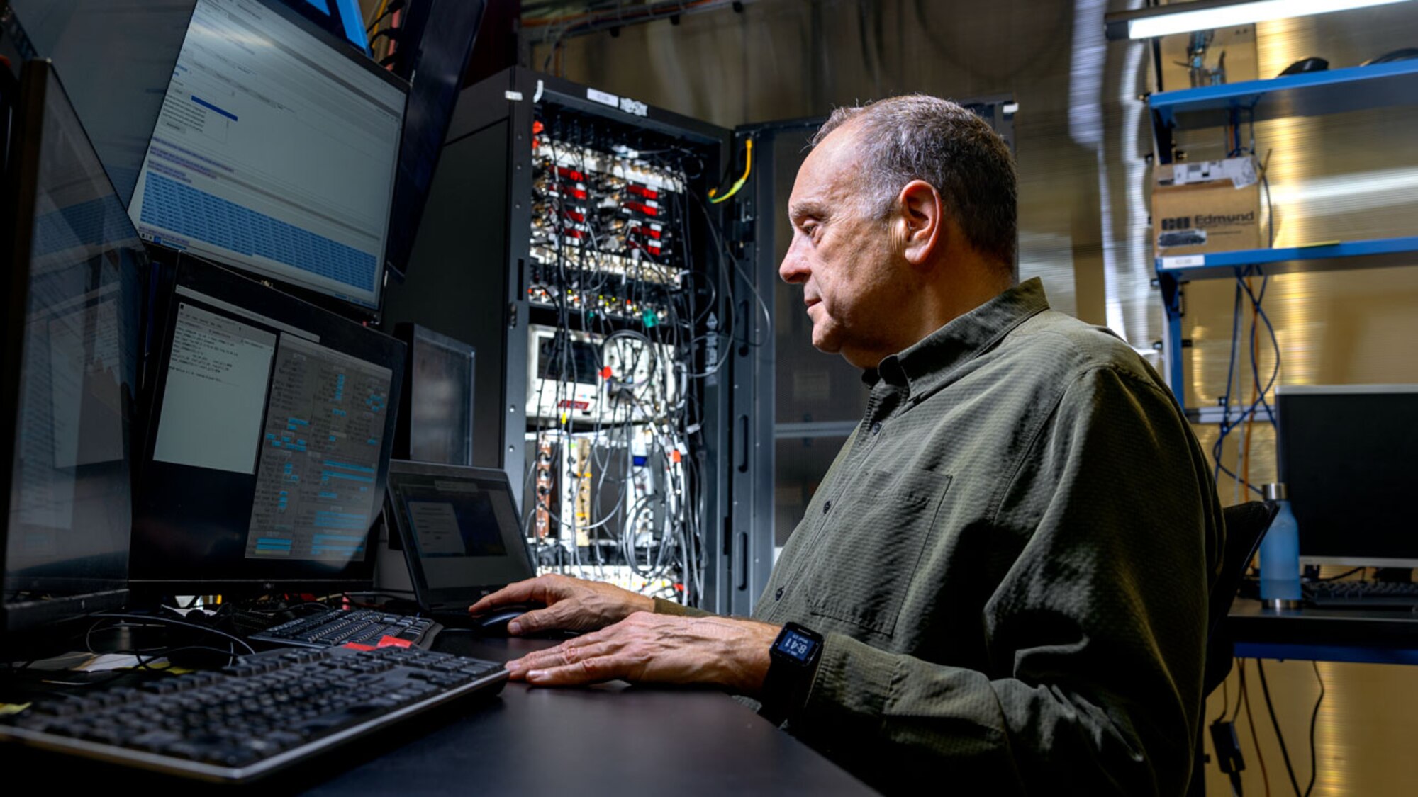 Matt Miller, professor of mechanical and aerospace engineering in Cornell's College of Engineering, at work in the Cornell High Energy Synchrotron Source (CHESS). Miller is principal investigator for the Materials Solutions Network at CHESS, which provides dedicated access to two X-ray beamlines for the Air Force and other Department of Defense researchers, as well as original equipment manufacturers, to improve the performance and safety of new and existing materials and designs for military components, targeting issues such as fatigue and residual stress. (Courtesy photo Cornell University/Jason Koski)