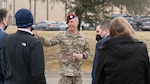 Chief Master Sgt. Todd Popovic, Special Warfare Training Wing command chief (center), briefs a delegation of Senate staff members from across the United States on the significance of the SWTW memorial site on Joint Base San Antonio-Chapman Training Annex, Texas, Feb. 23, 2022. The delegation visited the Special Warfare Training Wing to learn more about Air Force Special Warfare and the unique capabilities AFSPECWAR operators bring to the battlefield.