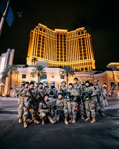 Nevada National Guard Soldiers with the 72nd Military Police Company pose for a photo on the Las Vegas Strip on Dec. 31, 2021.