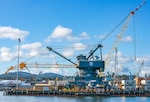 Crane 79 sits ready to be loaded onto a barge for shipment from Puget Sound Naval Shipyard & Intermediate Maintenance Facility to Portsmouth Naval Shipyard in Kittery, Maine, Nov. 16, 2021. (U.S. Navy photo by Wendy Hallmark)