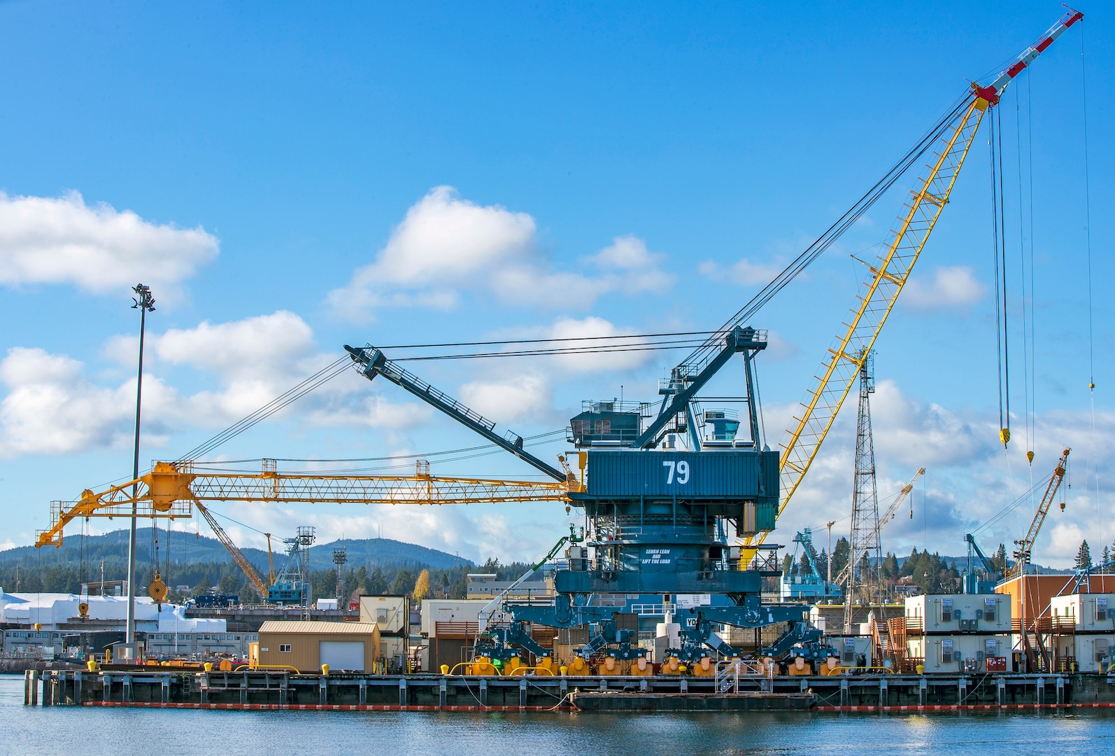 Crane 79 sits ready to be loaded onto a barge for shipment from Puget Sound Naval Shipyard & Intermediate Maintenance Facility to Portsmouth Naval Shipyard in Kittery, Maine, Nov. 16, 2021. (U.S. Navy photo by Wendy Hallmark)