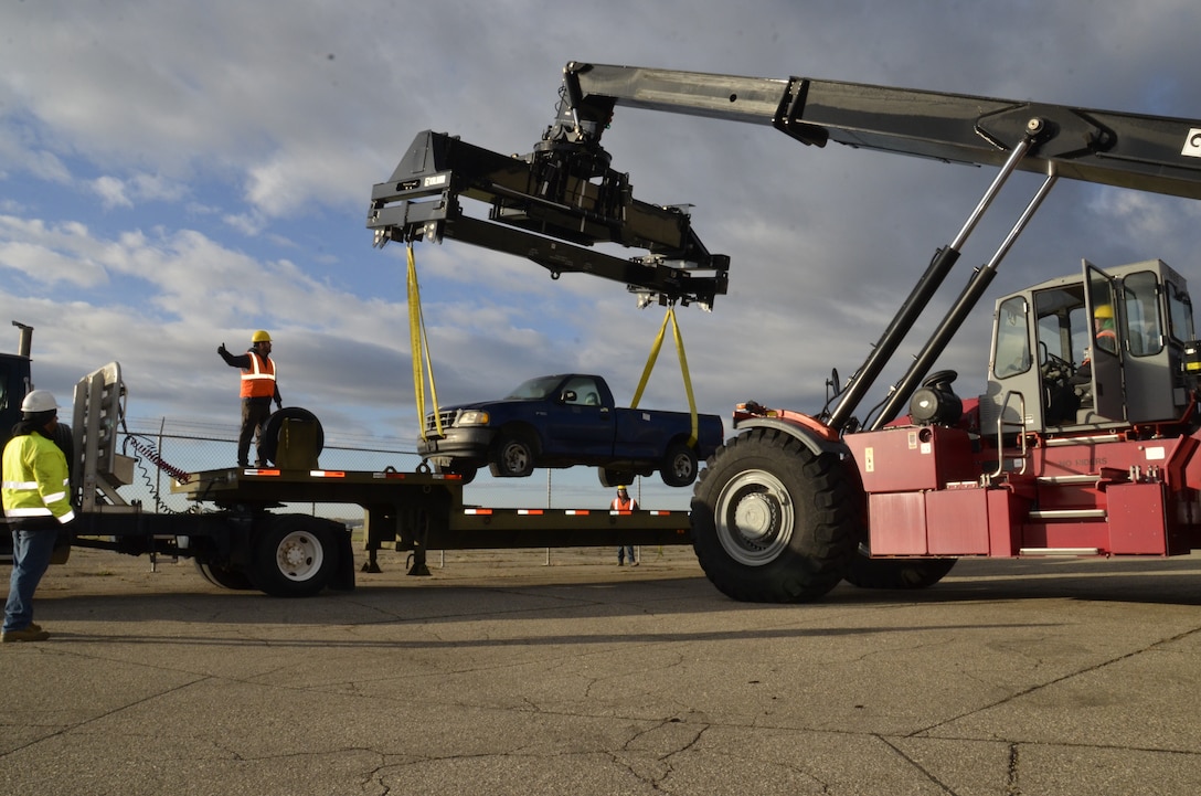 A sling is used to lift a pickup trick