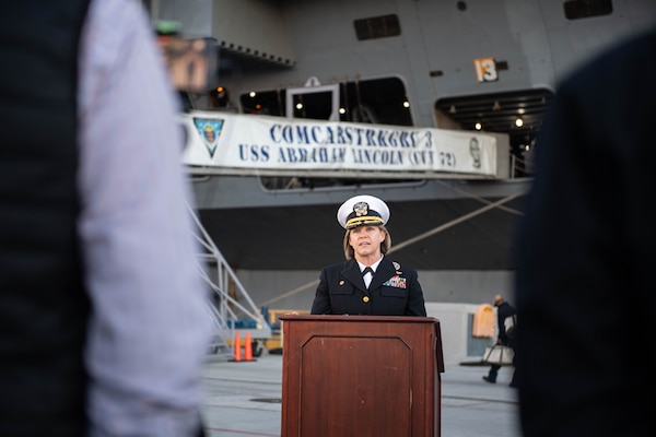 SAN DIEGO (Jan. 3, 2022) - Capt. Amy Bauernschmidt, commanding officer of Nimitz-class aircraft carrier USS Abraham Lincoln (CVN 72), speaks with local media during a press conference before the ship gets underway for a regularly-scheduled deployment. (U.S. Navy/MC1 Kelby Sanders)