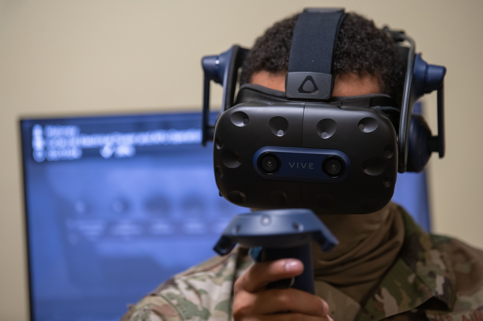 U.S. Air Force Senior Airman Matthew Brandon-Sellers, a 1st Special Operations Maintenance Squadron wheel and tire journeyman, operates a virtual reality device