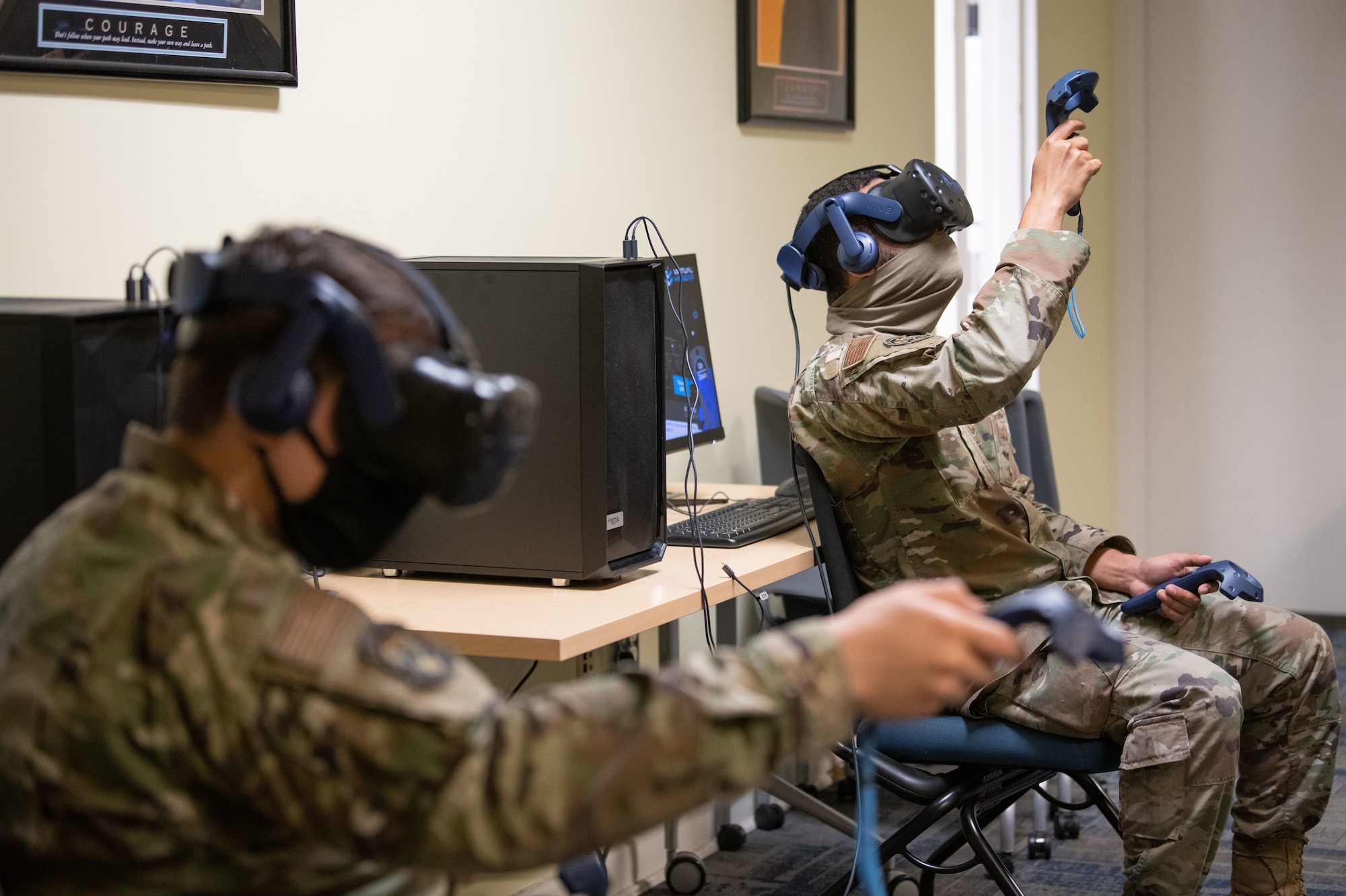 U.S. Air Force Senior Airman David Koon, left, and U.S. Air Force Senior Airman Matthew Brandon-Sellers, right, 1st Special Operations Maintenance Squadron wheel and tire journeymen, complete various tasks using virtual reality capabilities