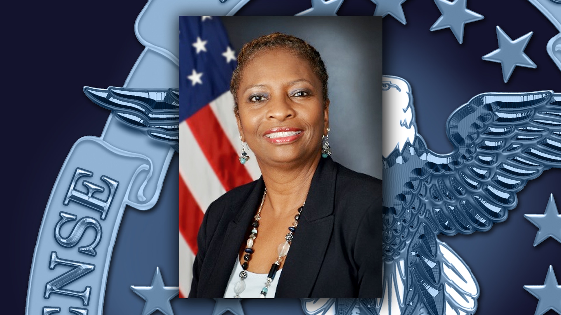 Head and shoulders image of a black women in front of the DLA and US flags