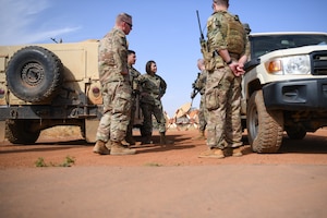 Chief Master Sgt. of the Air Force JoAnne S. Bass speaks to approximately Airmen during an all-call at Nigerien Air Base 101, Niamey, Dec. 22, 2021. During her visit to AB 101, Bass addressed the importance of how the U.S. Air Force must develop and build a deep intuitive understanding of our strategic competitors, and reward and retain Airmen who foster the personal attributes necessary for success. (U.S. Air Force photo by Senior Airman Ericka A. Woolever)