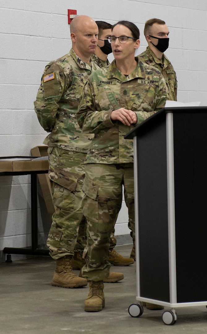 Command Sgt. Maj. Melinda Crosby, command sergeant major for the 186th Brigade Support Battalion, 86th Infantry Brigade Combat Team (Mountain), Vermont National Guard, speaks to 186th BSB Soldiers after assuming responsibility as command sergeant major in a ceremony in Northfield, Vermont, on Dec. 4, 2021. As command sergeant major, she will advise the 186th BSB commander on issues related to the battalion's enlisted Soldiers. (U.S. Army National Guard photo by Don Branum)