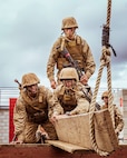 U.S. Marine Corps recruits with Alpha Company, 1st Recruit Training Battalion, participate in an obstacle challenge on Marine Corps Base Camp Pendleton, California, Dec. 29, 2021.