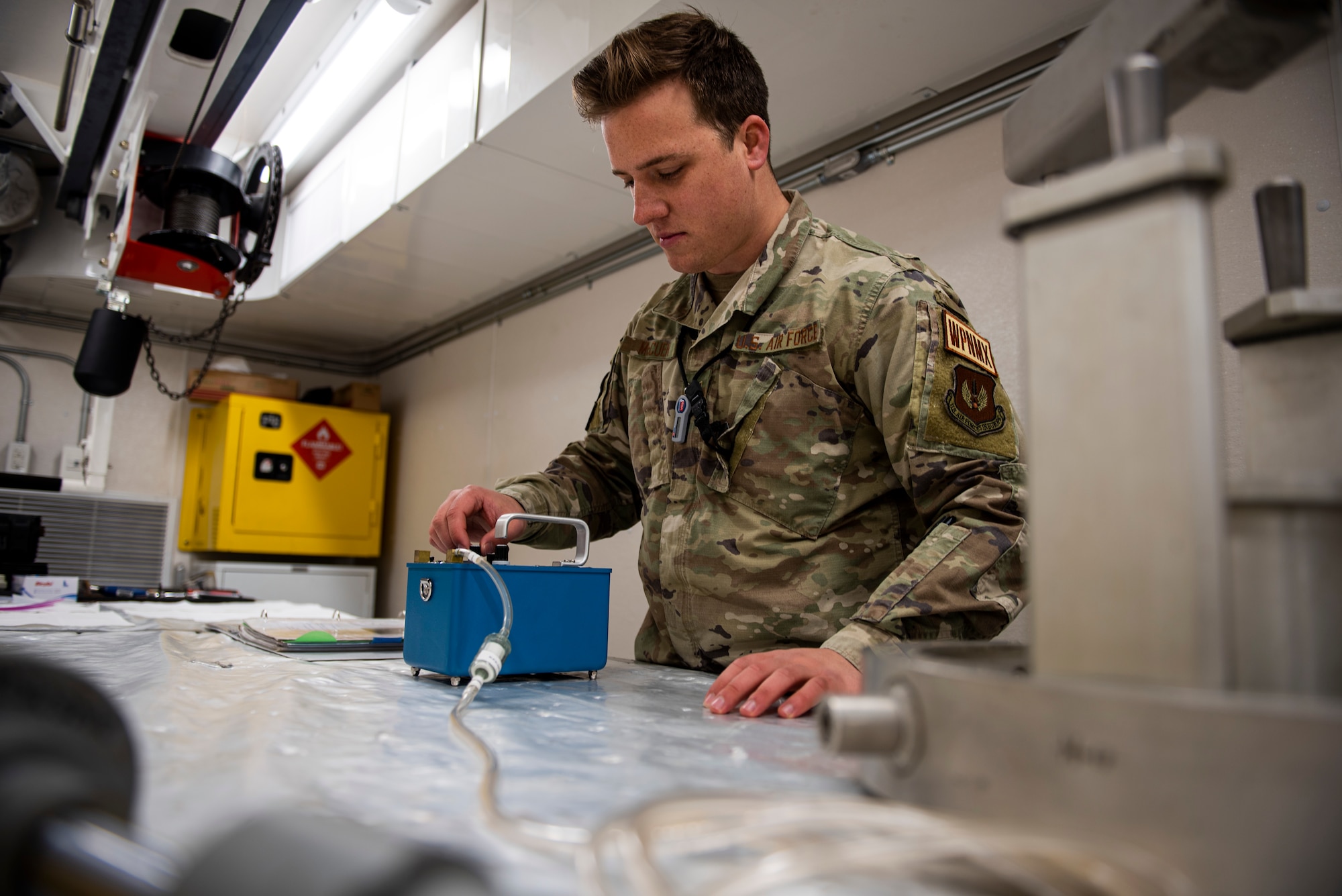 Senior Airman Weston McCuen, a special weapons technician assigned to the 39th Maintenance Squadron, inspects maintenance equipment at Incirlik Air Base, Turkey, Dec. 21, 2021.