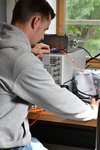 IMAGE: Naval Surface Warfare Center Dahlgren Division (NSWCDD) scientist Thomas Salvato tests vessel stopping efforts. Vessel stopping efforts fall under the directed energy umbrella at NSWCDD, using high powered microwaves.