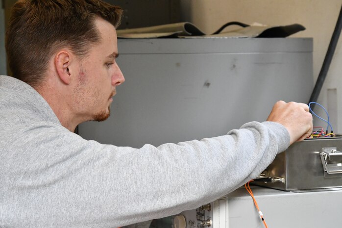 IMAGE: Naval Surface Warfare Center Dahlgren Division (NSWCDD) scientist Thomas Salvato tests vessel stopping efforts. Vessel stopping efforts fall under the directed energy umbrella at NSWCDD, using high powered microwaves.