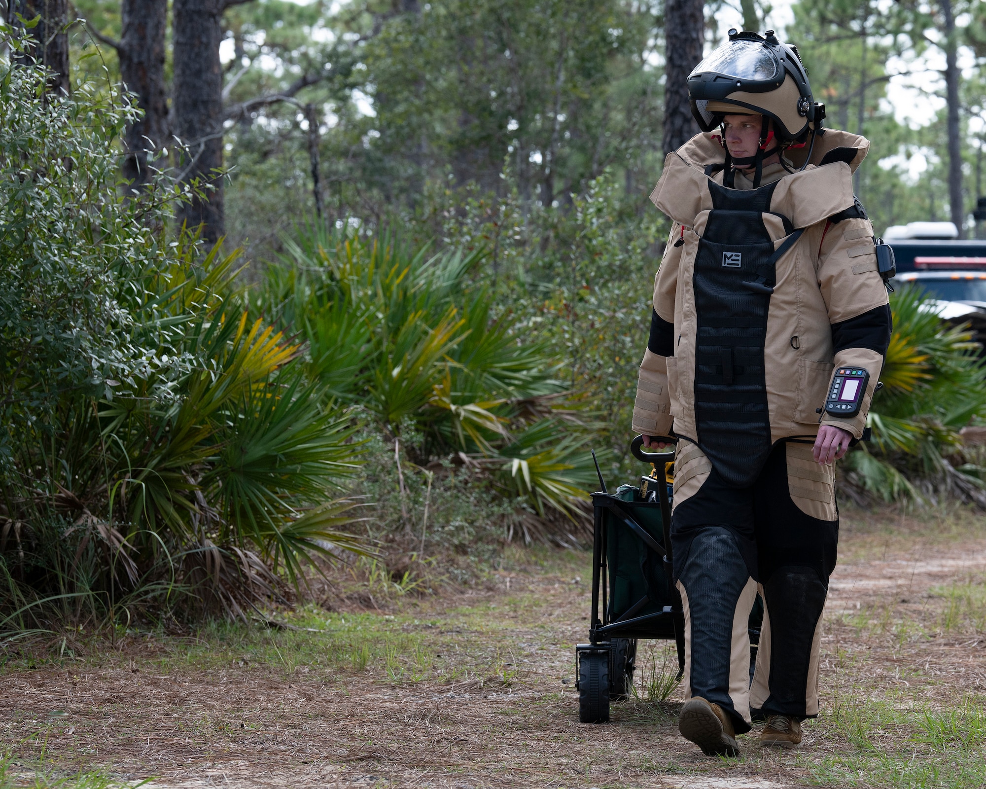 A 919th Special Operations Civil Engineer Squadron EOD tech pulls equipment for a simulated threat of an IED.