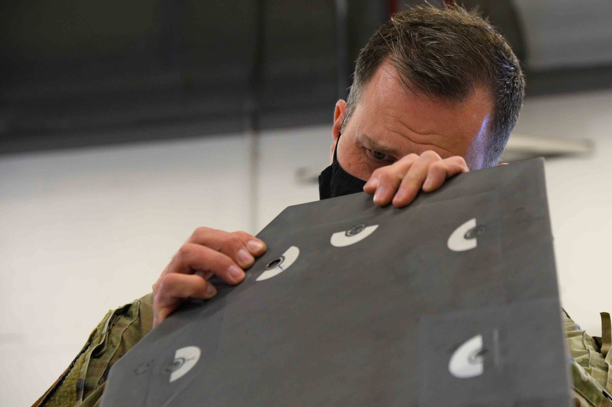 U.S. Air Force Staff Sgt. Matthew Hicks, 419th Maintenance Squadron low observable craftsman, conducts maintenance on an F-35A Lightning II panel Dec. 8, 2021 at Hill Air Force Base, Utah