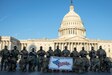 Soldiers with the 1431st Engineer Company (SAPPER), Michigan National Guard, pose for a unit photo near the U.S. Capitol building in Washington, D.C., March 6, 2021. The National Guard has been requested to continue supporting federal law enforcement agencies with security, communications, medical evacuation, logistics, and safety support to state, district and federal agencies through mid-March. (U.S. Army National Guard photo by Capt. Joe Legros)