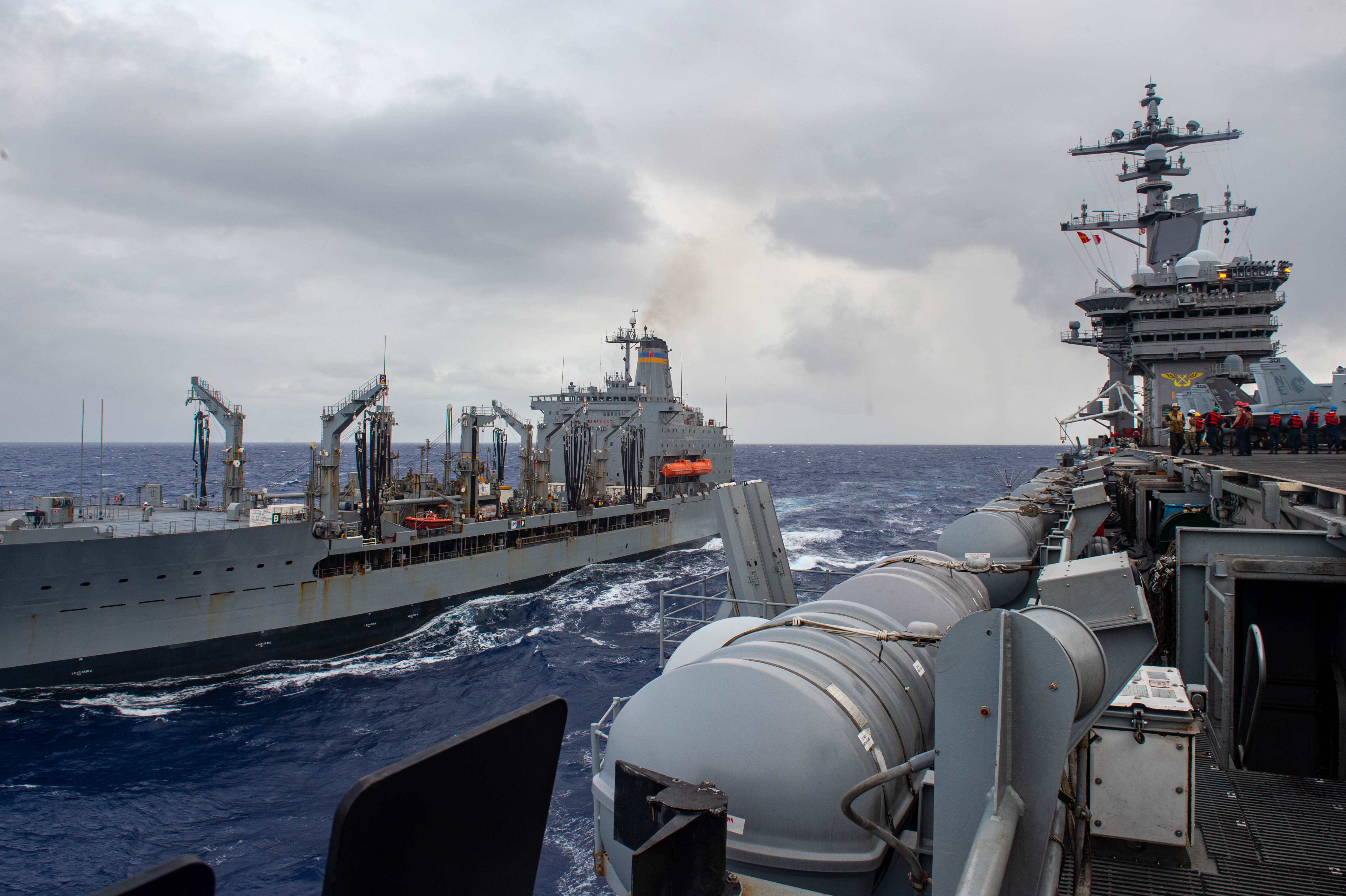 The Nimitz-class aircraft carrier USS Carl Vinson (CVN 70) participates in a replenishment-at-sea with the Henry J. Kaiser-class fleet replenishment oiler USNS John Ericsson (T-AO 194),