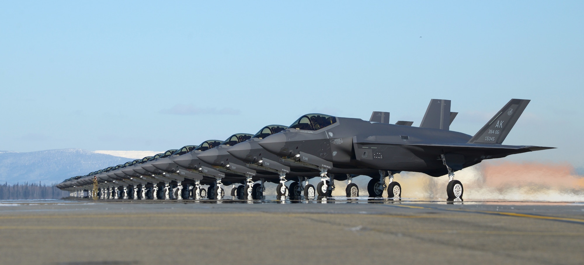 Twenty-five F-35A Lightning IIs assigned to the 354th Fighter Wing prepare to launch