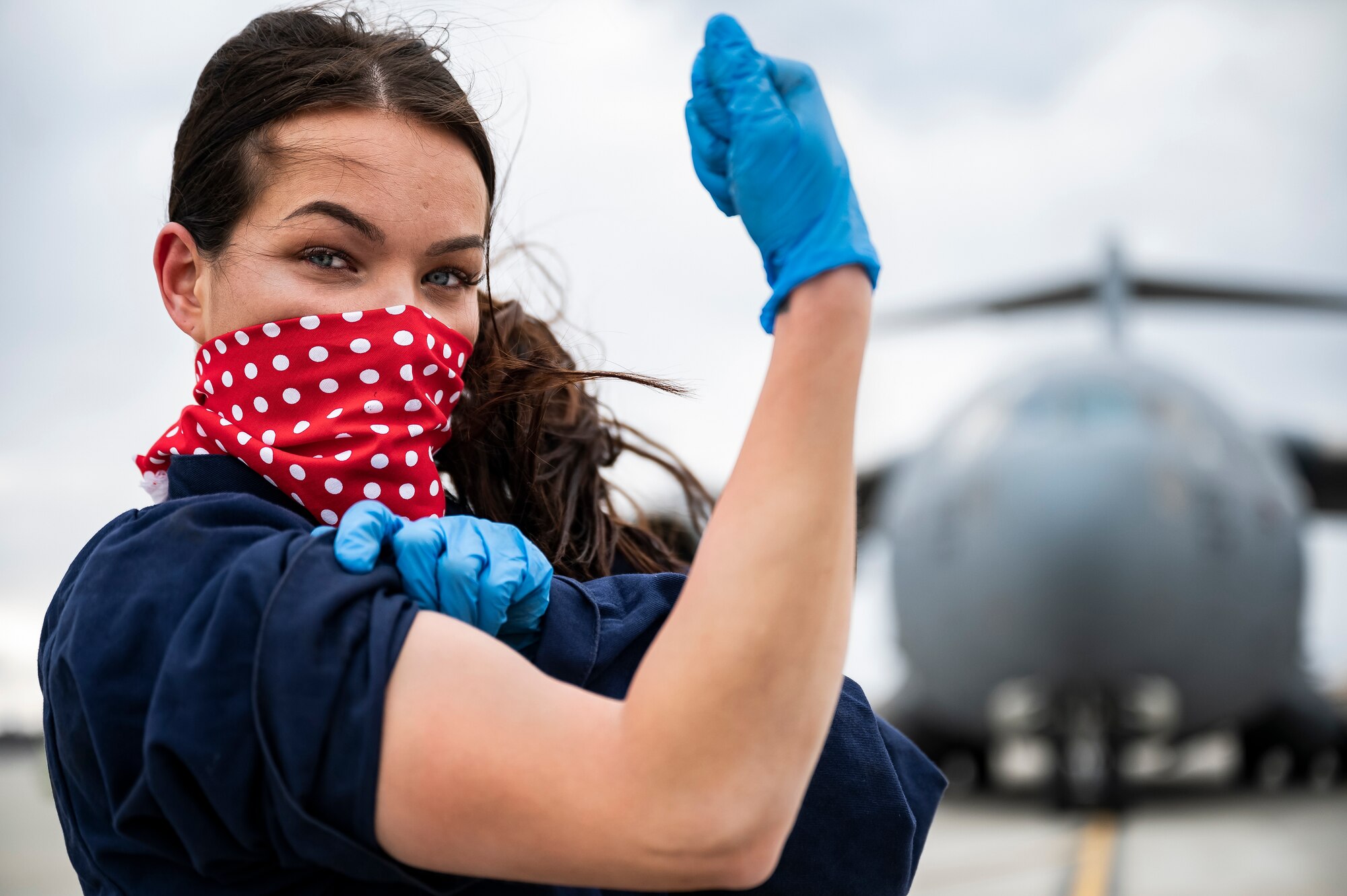 Airman 1st Class Bethany Dacus, 911th Aircraft Maintenance Squadron crew chief, poses for a photo