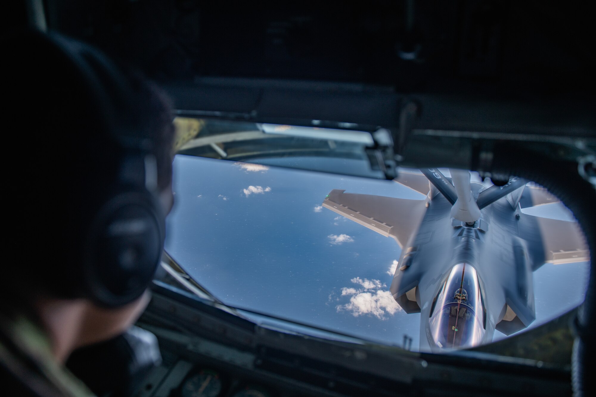 An Airman refuels a jet