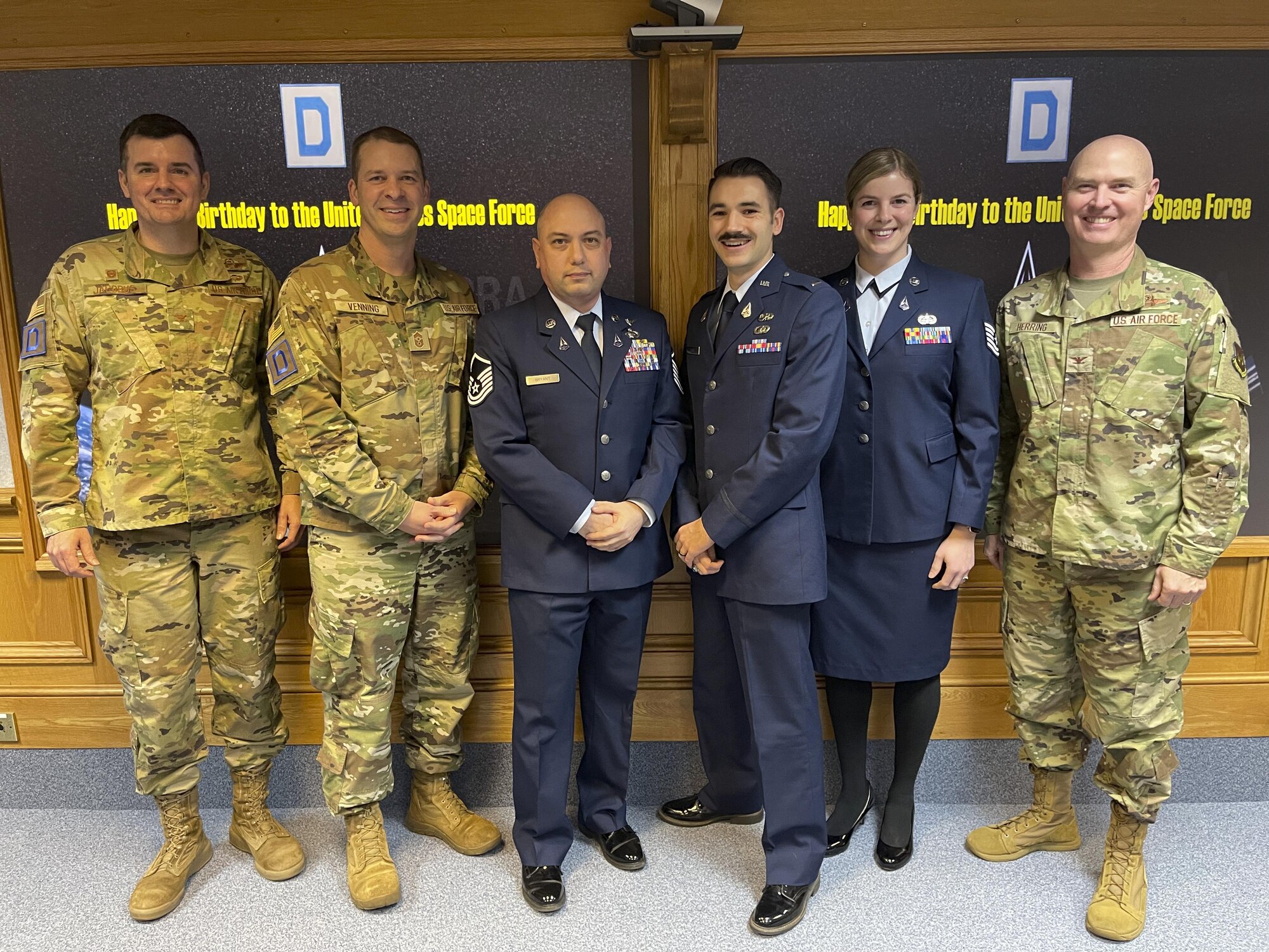 U.S. Airmen and Guardians assigned to the 100th Air Refueling Wing celebrated the U.S. Space Force’s second birthday at Royal Air Force Mildenhall, England, Dec. 20, 2021. The Space Force is part of the Department of the Air Force and is the youngest branch of the U.S. military. (U.S. Air Force photo by Senior Airman Joseph Barron)