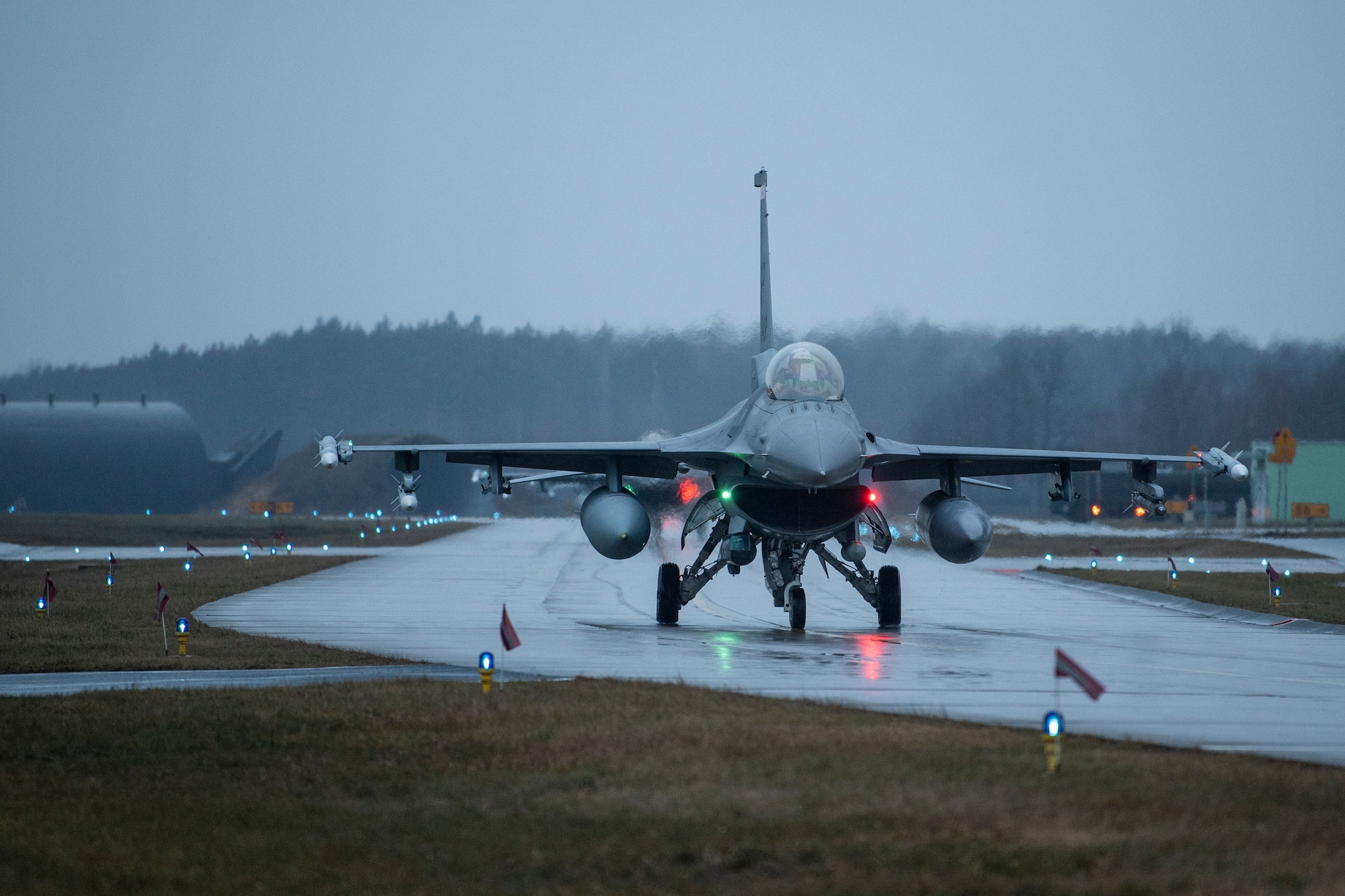 A U.S. Air Force F-16 Fighting Falcon assigned to the 480th Fighter Squadron at Spangdahlem Air Base, Germany, taxis at Łask Air Base, Poland, January 4, 2022.