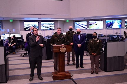 Maj. Gen. Timothy Gowen, the adjutant general of Maryland, speaks at a press conference in Hanover, Md., Jan. 4, 2022, with Gov. Larry Hogan, who declared a state of emergency due to rising COVID-19 hospitalizations. As many as 1,000 Maryland National Guard Soldiers and Airmen will assist state and local health officials with the state’s pandemic response.