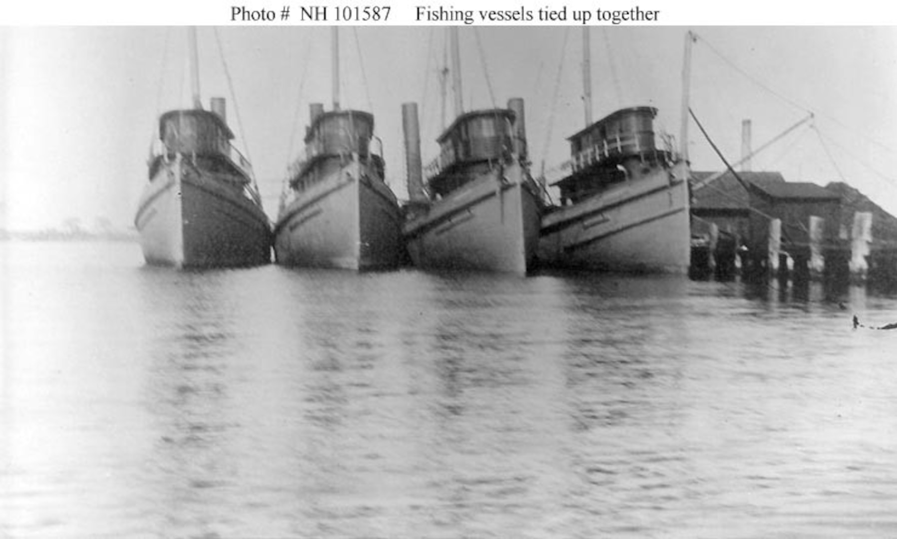 .  Photo of Menhaden fishing vessels about to be converted to naval vessels for wartime service. (Naval History and Heritage Command)