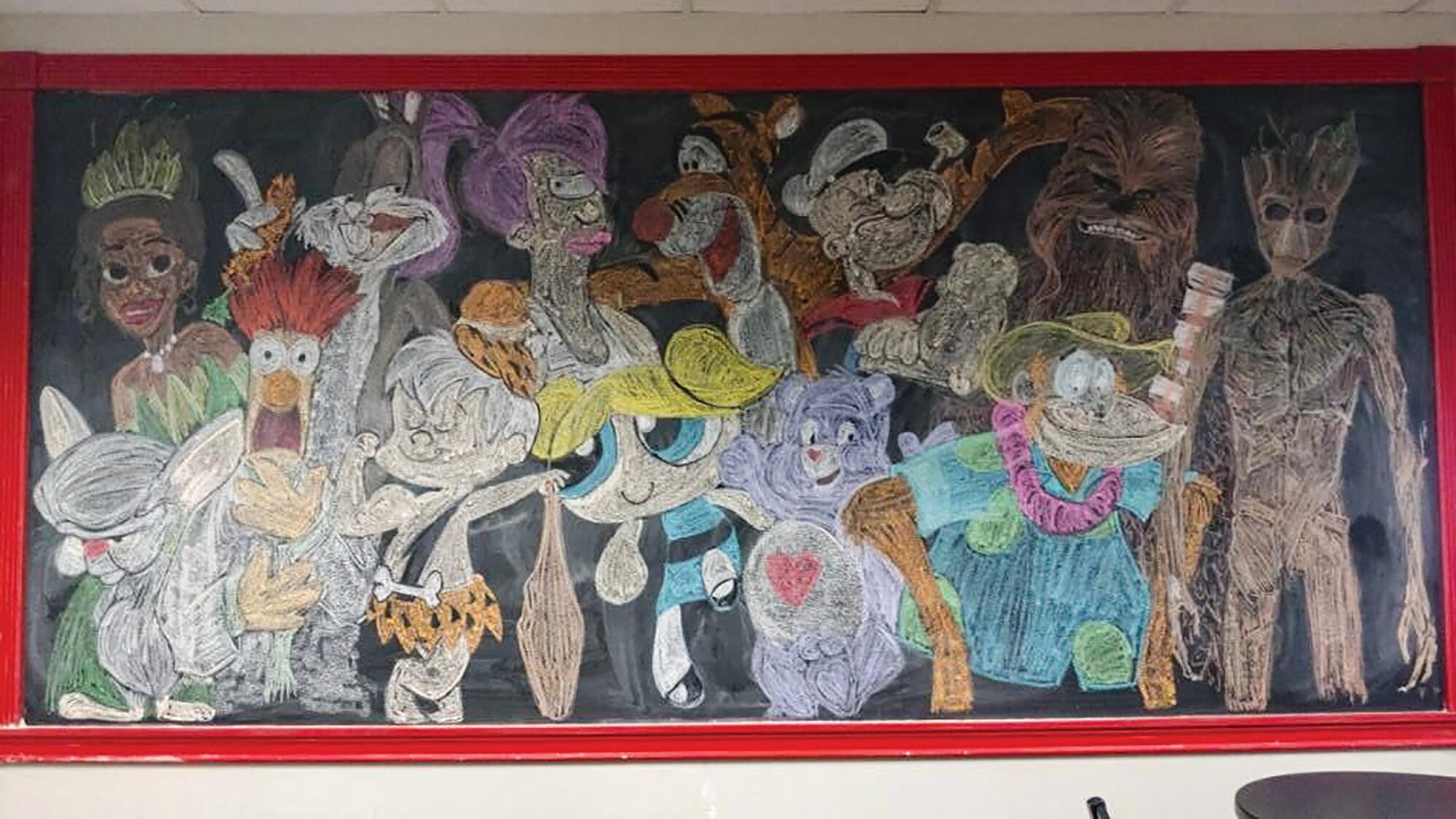 Capt. Michael Schibler, a flight nurse for the 445th Aeromedical Evacuation Squadron, creates engaging chalkboard drawings for all to enjoy in the common area of the squadron. He has been displaying his various creations since joining the squadron in 2015.