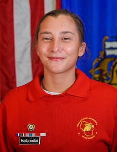 Wisconsin National Guard Challenge Academy Cadet Chloe Halbrooks of Walworth, Wisconsin, graduated from the residential phase of the program Dec. 22, 2021. She said she now sees herself as successful instead of a failure.