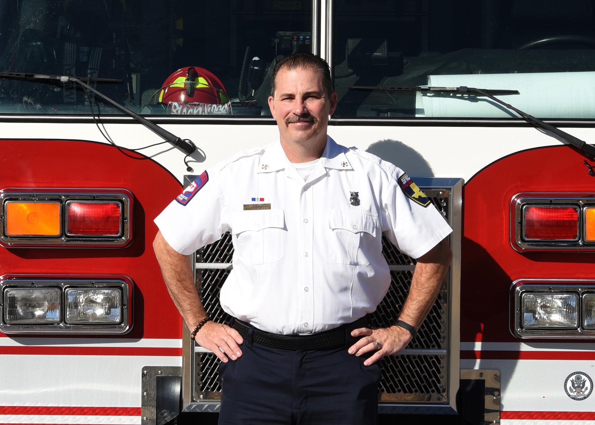 Billy Clemons, 17th Civil Engineer Squadron assistant chief of prevention, poses for a photo outside the Goodfellow Air Force Base Fire Department on Goodfellow Air Force Base, Texas, January 4, 2022. Clemons’ experiences with foster care and adoption adds to the Air Force’s community of diversity . (U.S. Air Force photo by Senior Airman Abbey Rieves)