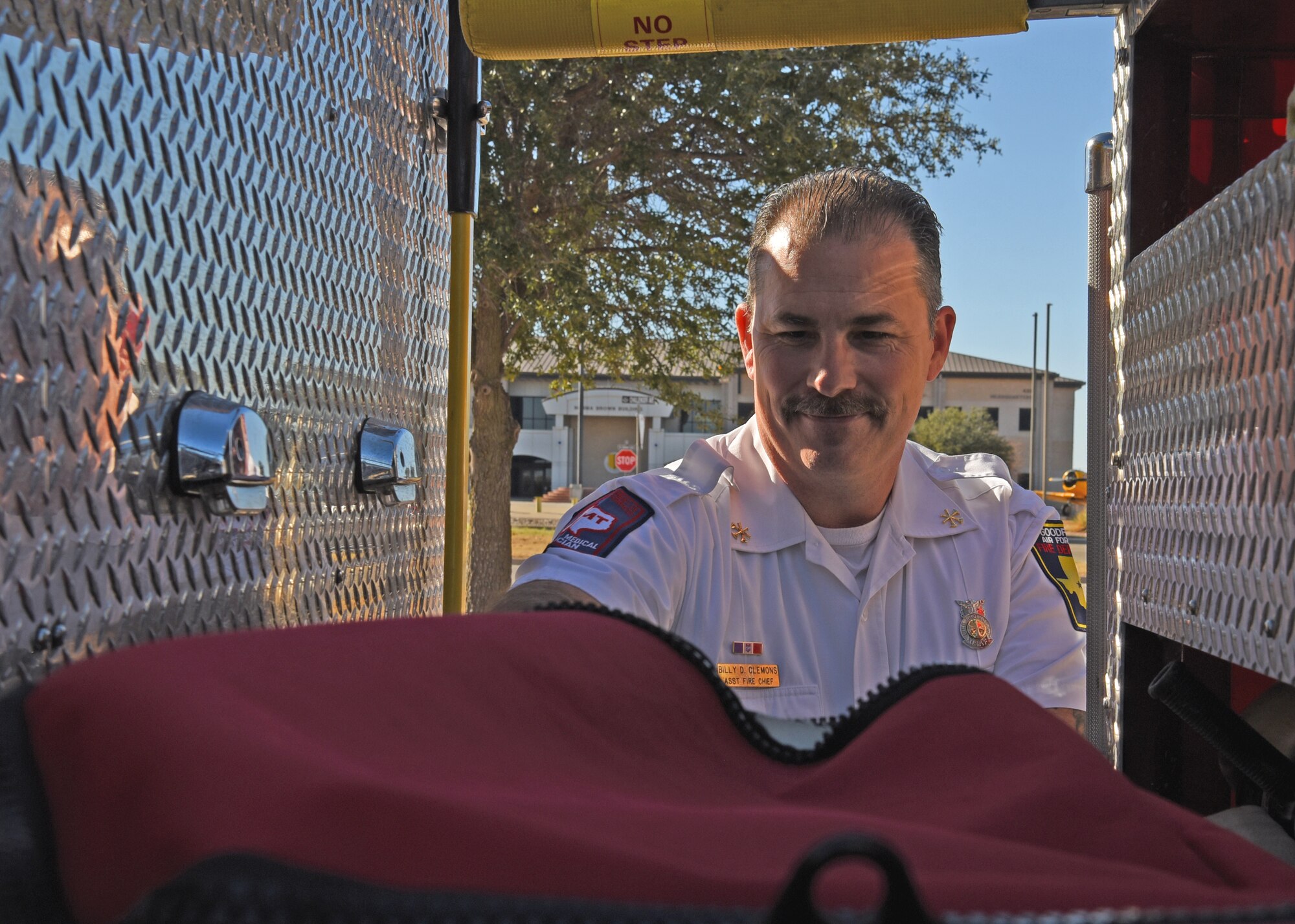 Billy Clemons, 17th Civil Engineer Squadron assistant chief of prevention, checks a fire truck’s inventory at the base fire department on Goodfellow Air Force Base, Texas, January 4, 2022. Clemons has worked at the Goodfellow Air Force Base Fire Department for over ten years. (U.S. Air Force photo by Senior Airman Abbey Rieves)