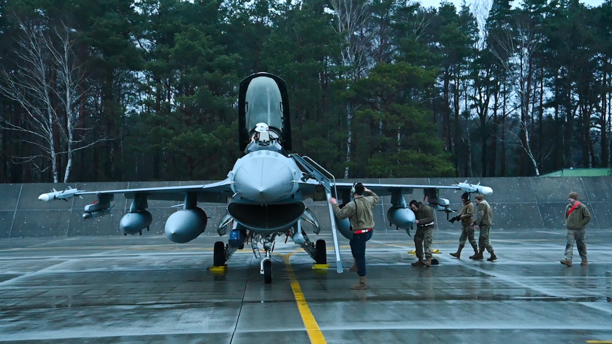 A U.S. Air Force F-16 Fighting Falcon assigned to the 480th Fighter Squadron at Spangdahlem Air Base, Germany, sits on an apron after arriving at Łask Air Base, Poland, January 4, 2022.