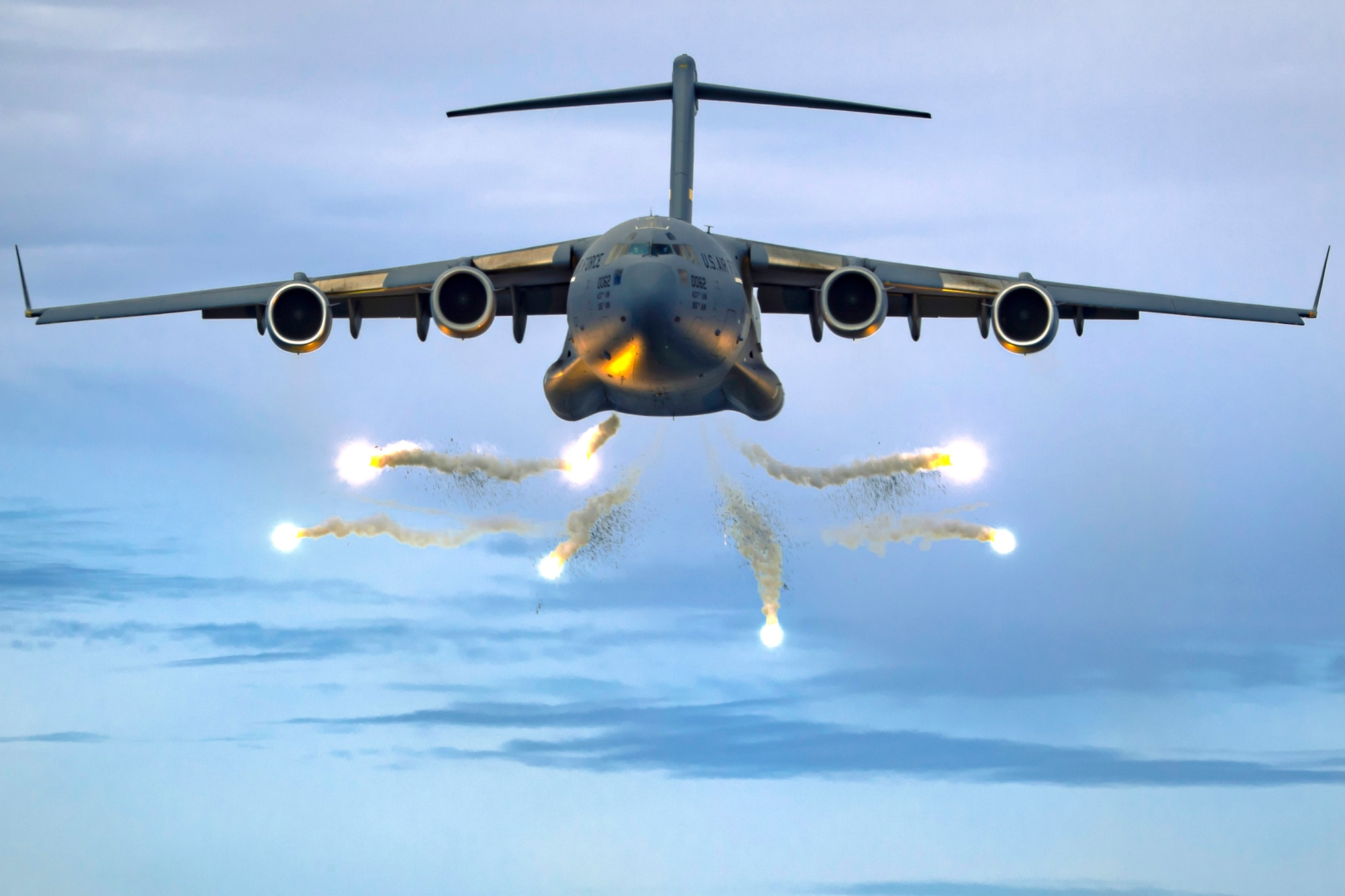 A C-17 Globemaster III assigned to Joint Base Charleston deploys flares