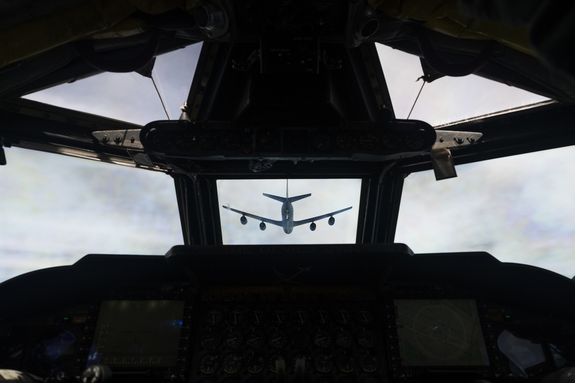 A U.S. Air Force KC-135 Stratotanker, assigned to the 117th Air Refueling Squadron, Kansas Air National Guard, Kan., prepares to refuel a B-52H Stratofortress