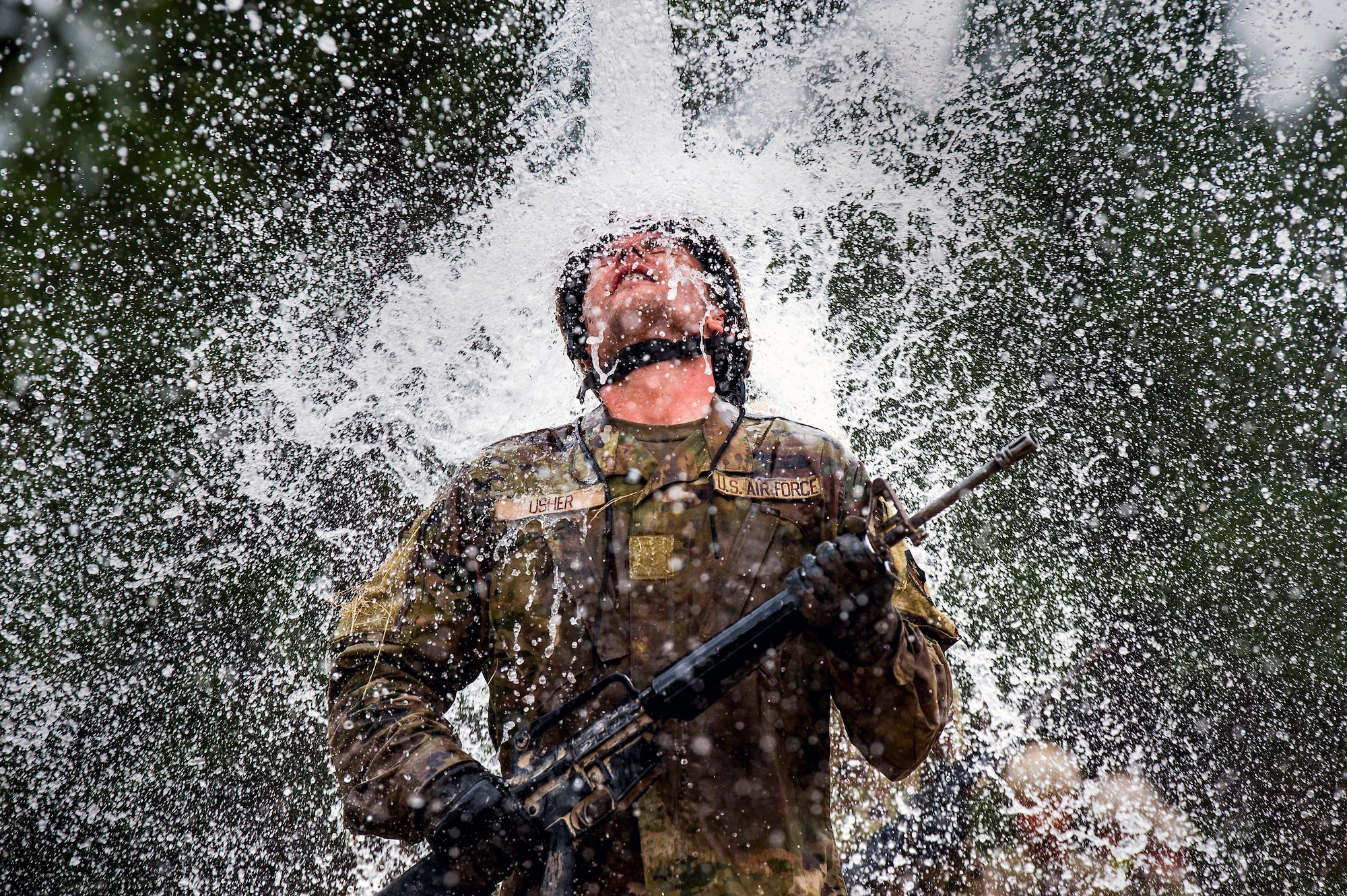 A Class of 2025 cadet completes the assault course