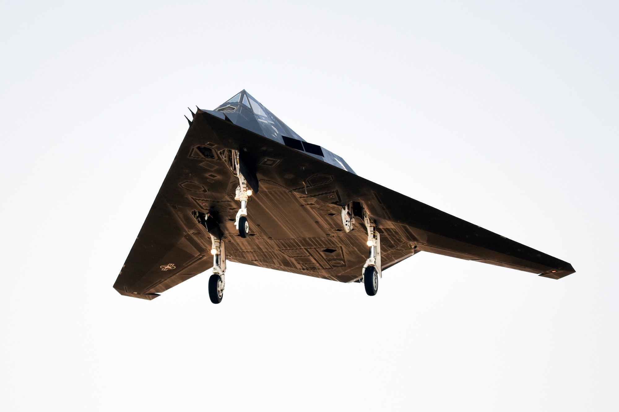 An F-117 Nighthawk lands