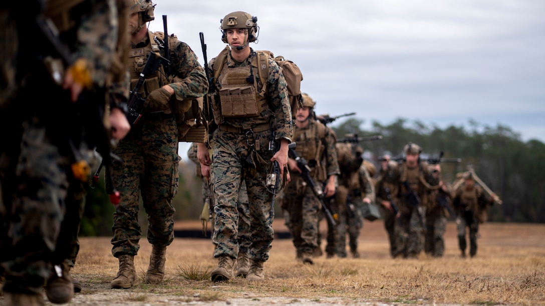 Marines assigned to 2nd Battalion, 6th Marine Regiment conduct an embassy reinforcement exercise on Camp Lejeune, N.C., Dec. 12, 2021. The Marines established a forward command element, brought in embassy reinforcements, and conducted a mass casualty drill. Role players are used to create a realistic training environment.
