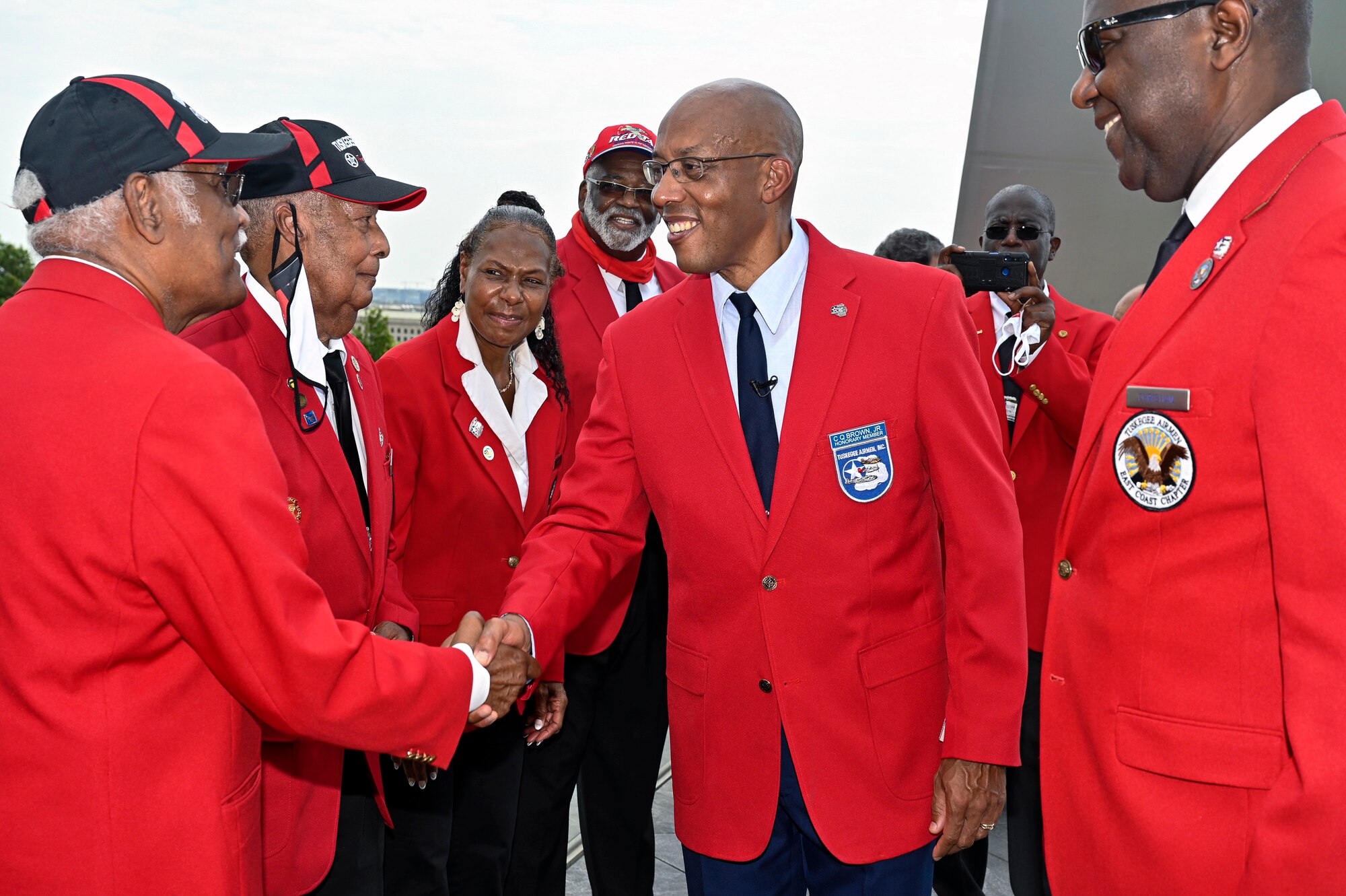 Air Force Chief of Staff Gen. CQ Brown, Jr. greets members of the Tuskegee Airmen