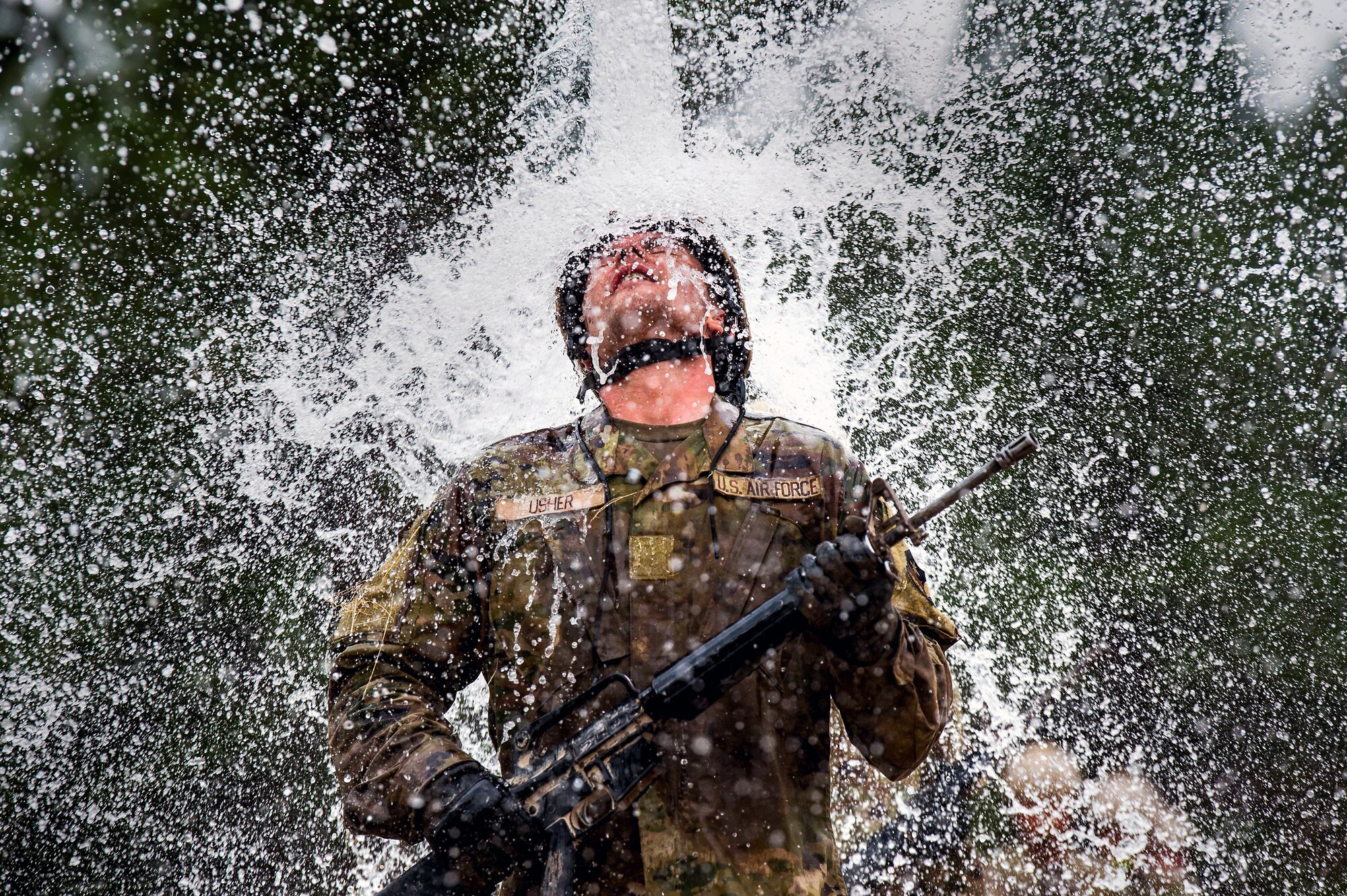 A Class of 2025 cadet completes the assault course