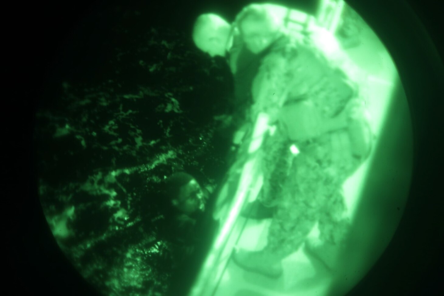 The crew of the Sentinel-class USCGC Glen Harris (WPC 1145) prepare to receive migrants rescued from the water in the Atlantic Ocean Jan. 5, 2021.