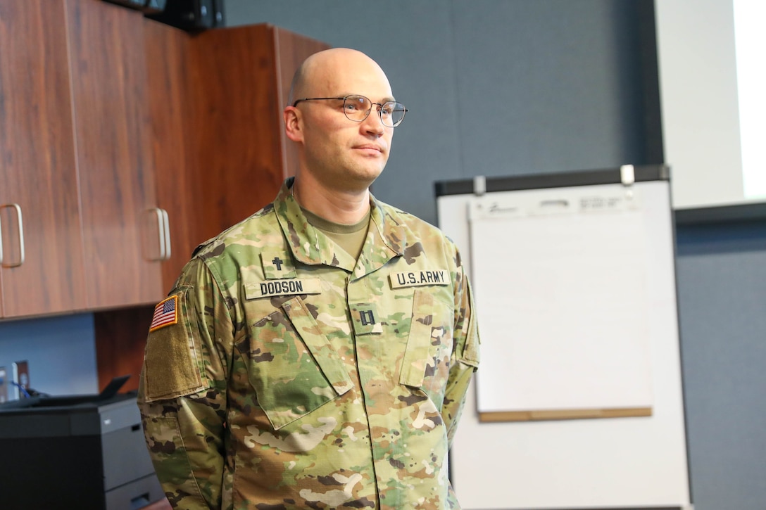 Chaplain (Capt.) Jonathan Dodson, 412th Civil Affairs Battalion (Airborne), awaits feedback after his briefing during the U.S. Army Civil Affairs and Psychological Operations Command (Airborne) Combined Religious Area Assessment and Chaplain Religious Leader Engagement training held November 16—19, 2021, at Fort Jackson, South Carolina.