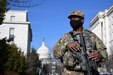 Sgt. Kaherdin Charles, a cavalry scout with Troop B, 2nd Squadron, 104th Cavalry Regiment, Pennsylvania National Guard, patrols near the Capitol in Washington, D.C., Jan. 14, 2021. National Guard Soldiers and Airmen from several states have traveled to Washington to provide support to federal and District authorities leading up to the 59th Presidential Inauguration.